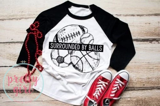 surrounded by balls ADULT TSHIRT